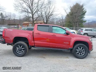2015 Chevrolet Colorado 4WD Z71 with VIN 1GCGTCE3XF1134799, listed as a IAAI auction lot 41654026 with 104,830 mi miles. Bid and sale history available at carsss.com. Image 14.