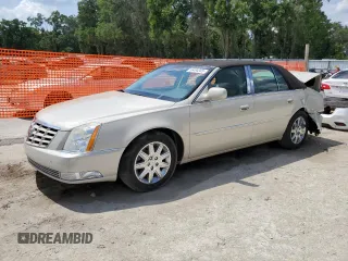2011 Cadillac DTS Premium Collection z VIN 1G6KH5E62BU144403, wystawiony jako Copart lot #56494305 z przebiegiem 51 950 mil mil oraz Szkody całkowita. Historia ofert i sprzedaży dostępna na DreamBid. Obrazek 1.