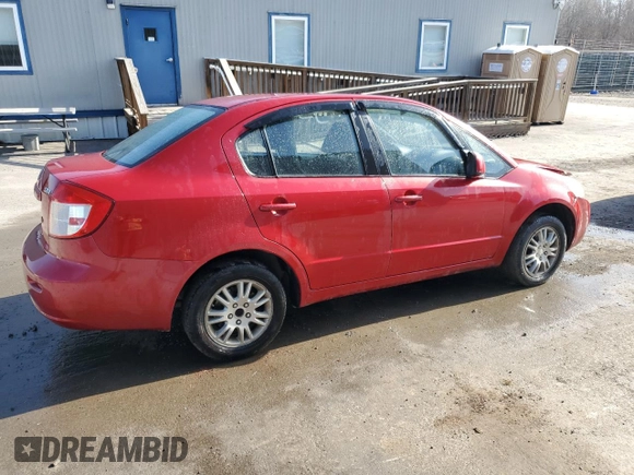 2012 Suzuki SX4 LE z VIN JS2YC5A34C6300969, wystawiony jako Copart lot #49036095 z przebiegiem 163 367 mil mil oraz Szkoda całkowita • Salvage title. Historia ofert i sprzedaży dostępna na DreamBid. Obrazek 3.