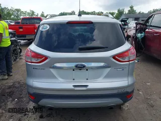 2016 Ford Escape Titanium with VIN 1FMCU9J95GUB93585, listed as a IAAI auction lot 42614106 with 124,465 mi miles and . Bid and sale history available at DreamBid. Image 16.