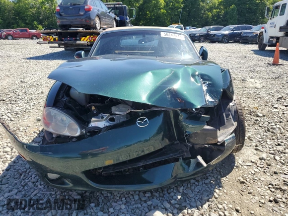 2001 Mazda MX-5 Miata with VIN JM1NB353410203639, listed as a Copart auction lot 56447414 with 131,520 mi miles and Salvage Title. Bid and sale history available at DreamBid. Image 5.