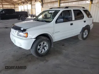 2000 Isuzu Rodeo S with VIN 4S2CK58W3Y4323965, listed as a Copart auction lot 61189435 with 211,726 mi miles and Salvage title. Bid and sale history available at DreamBid. Image 1.
