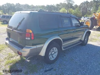 2000 Mitsubishi Montero Sport LS with VIN JA4LS31H0YP055199, listed as a IAAI auction lot 41990427 with 162,687 mi miles. Bid and sale history available at carsss.com. Image 4.