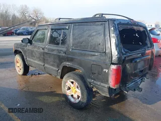 2000 Jeep Cherokee Classic with VIN 1J4FF58SXYL215871, listed as a IAAI auction lot 41855165 with 132,284 mi miles. Bid and sale history available at carsss.com. Image 3.