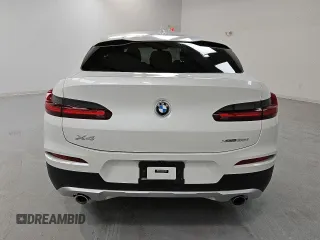 2021 BMW X4 xDrive30i with VIN 5UX2V1C04M9E94765, listed as a Copart auction lot 49813915 with 34,483 mi miles and Clean Title. Bid and sale history available at carsss.com. Image 6.