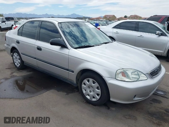 1999 Honda Civic LX with VIN JHMEJ6671XS003027, listed as a IAAI auction lot 41825146 with 197,764 mi miles and . Bid and sale history available at DreamBid. Image 1.