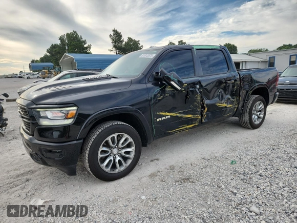 2020 Ram 1500 Laramie with VIN 1C6SRFJT5LN178284, listed as a Copart auction lot 61813575 with 90,699 mi miles and Salvage title. Bid and sale history available at DreamBid. Image 1.