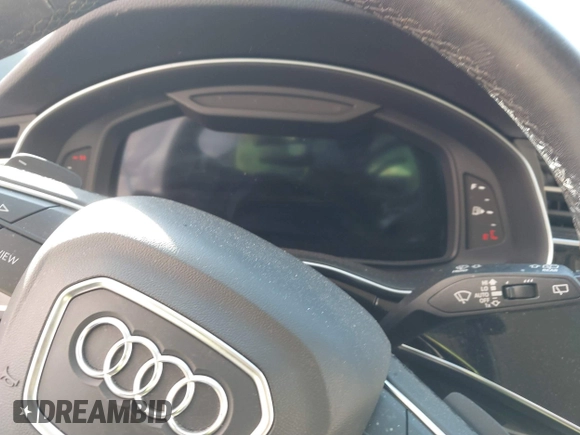 2023 Audi Q7 Premium with VIN WA1ACBF72PD021053, listed as a IAAI auction lot 41387794 with 11,462 mi miles and . Bid and sale history available at DreamBid. Image 7.
