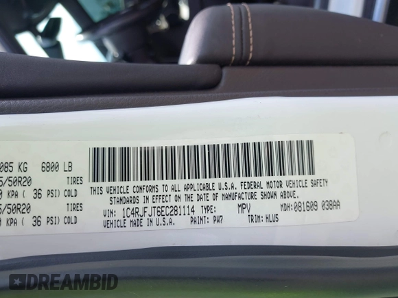 2014 Jeep Grand Cherokee Summit with VIN 1C4RJFJT6EC281114, listed as a IAAI auction lot 42497582 with 128,181 mi miles and . Bid and sale history available at DreamBid. Image 9.