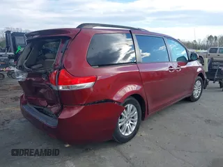 2014 Toyota Sienna XLE with VIN 5TDYK3DCXES442968, listed as a IAAI auction lot 41241310 with 132,020 mi miles and . Bid and sale history available at DreamBid. Image 4.