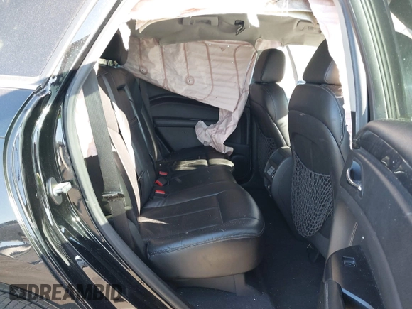 2015 Cadillac SRX z VIN 3GYFNAE32FS543933, wystawiony jako IAAI lot #41578338 z przebiegiem 150 937 mil mil oraz . Historia ofert i sprzedaży dostępna na DreamBid. Obrazek 8.