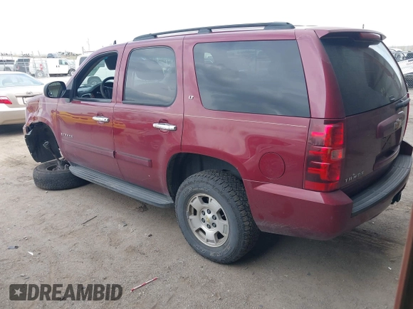 2007 Chevrolet Tahoe LTZ with VIN 1GNFK130X7J313106, listed as a IAAI auction lot 42042891 with 199,763 mi miles and . Bid and sale history available at DreamBid. Image 3.