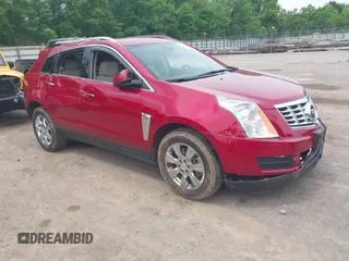 2015 Cadillac SRX Luxury Collection z VIN 3GYFNBE39FS512054, wystawiony jako IAAI lot #42309507 z przebiegiem 78 205 mil mil oraz . Historia ofert i sprzedaży dostępna na DreamBid. Obrazek 1.