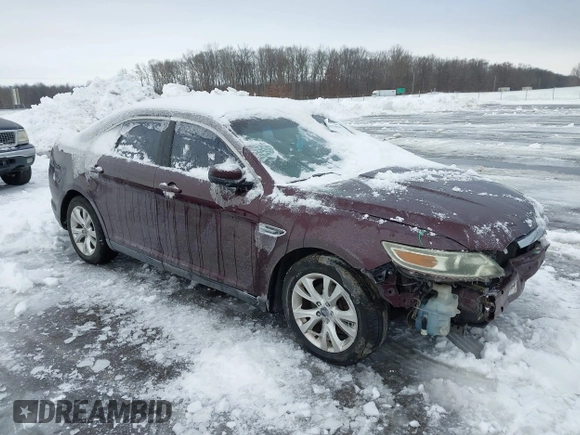 2011 Ford Taurus SEL with VIN 1FAHP2EW4BG115630, listed as a IAAI auction lot 41276945 with 166,867 mi miles. Bid and sale history available at carsss.com. Image 1.