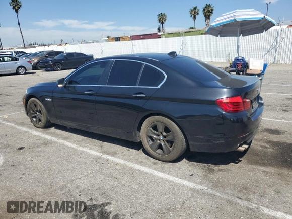 2013 BMW 5 Series 528i with VIN WBAXG5C59DDY35556, listed as a Copart auction lot 52978635 with 101,376 mi miles and Clean Title. Bid and sale history available at carsss.com. Image 2.