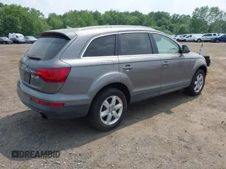 2013 Audi Q7 Premium Plus with VIN WA1LGAFE5DD014132, listed as a IAAI auction lot 42458839 with 135,687 mi miles and . Bid and sale history available at DreamBid. Image 4.