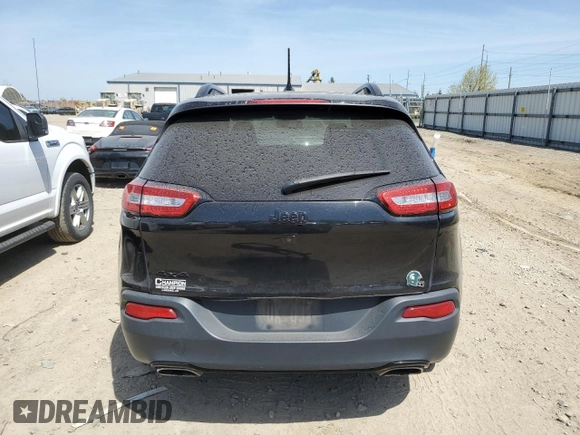 2015 Jeep Cherokee North with VIN 1C4PJMCS7FW750727, listed as a Copart auction lot 54077855 with 242,449 mi miles and Clean Title. Bid and sale history available at carsss.com. Image 6.