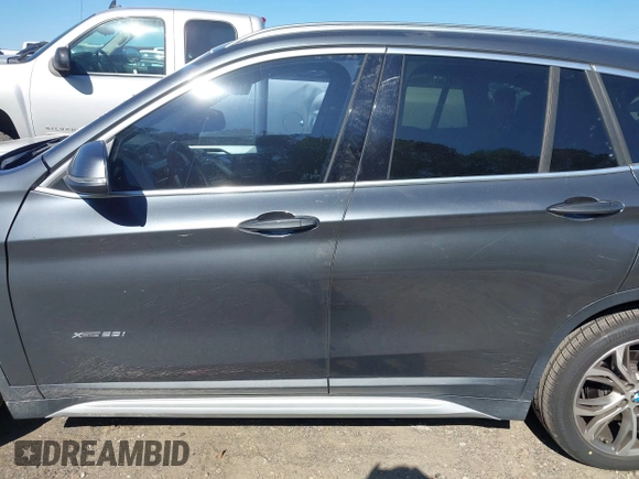 2017 BMW X1 xDrive28i with VIN WBXHT3C31H5F80056, listed as a IAAI auction lot 42049925 with 64,471 mi miles and . Bid and sale history available at DreamBid. Image 14.