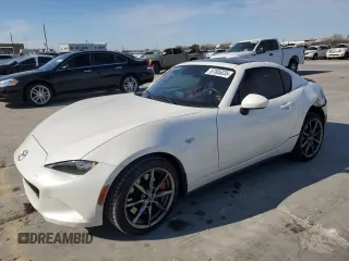 2020 Mazda MX-5 Miata Grand Touring z VIN JM1NDAM73L0412201, wystawiony jako Copart lot #87885035 z przebiegiem 55 935 mil mil oraz Szkoda całkowita • Salvage title. Historia ofert i sprzedaży dostępna na DreamBid. Obrazek 1.
