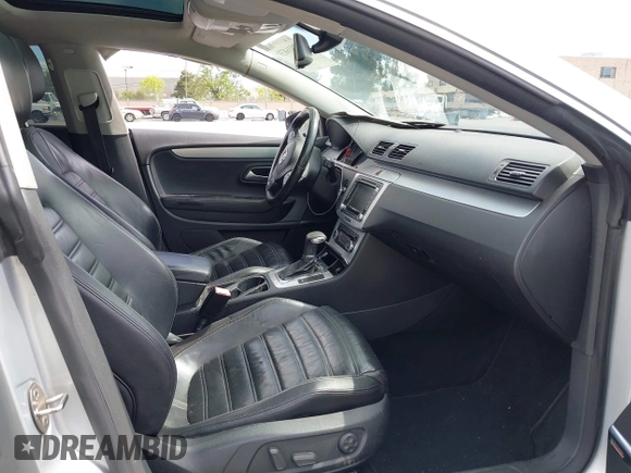 2009 Volkswagen CC 4Motion with VIN WVWGU73C49E514712, listed as a IAAI auction lot 42016839 with 1 mi miles. Bid and sale history available at carsss.com. Image 5.