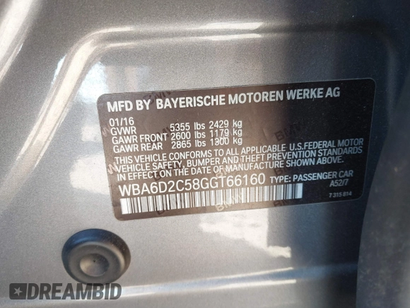 2016 BMW 6 Series 640i xDrive with VIN WBA6D2C58GGT66160, listed as a IAAI auction lot 41130666 with 102,064 mi miles and . Bid and sale history available at carsss.com. Image 9.