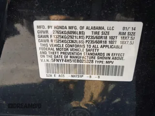 2014 Honda Pilot EX-L with VIN 5FNYF4H51EB025328, listed as a IAAI auction lot 41787439 with 169,313 mi miles and . Bid and sale history available at DreamBid. Image 9.