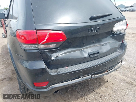 2015 Jeep Grand Cherokee Altitude z VIN 1C4RJFAG5FC682058, wystawiony jako IAAI lot #42352814 z przebiegiem 228 067 mil mil oraz . Historia ofert i sprzedaży dostępna na DreamBid. Obrazek 6.