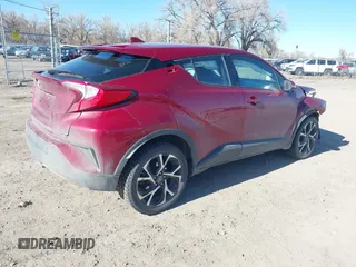 2018 Toyota C-HR XLE z VIN NMTKHMBX5JR051056, wystawiony jako IAAI lot #41740517 z przebiegiem 80 368 mil mil oraz . Historia ofert i sprzedaży dostępna na DreamBid. Obrazek 4.