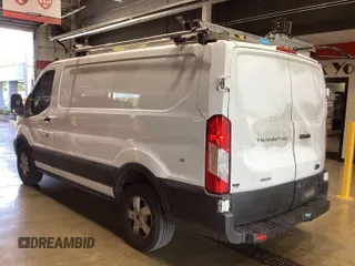 2019 Ford Transit z VIN 1FTYR1YGXKKA54025, wystawiony jako IAAI lot #42650341 z przebiegiem 129 672 mil mil oraz . Historia ofert i sprzedaży dostępna na DreamBid. Obrazek 14.