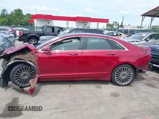2014 Lincoln MKZ z VIN 3LN6L2G93ER802398, wystawiony jako IAAI lot #42205802 z przebiegiem 187 511 mil mil oraz . Historia ofert i sprzedaży dostępna na DreamBid. Obrazek 14.