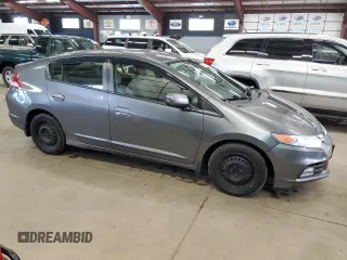 2013 Honda Insight z VIN JHMZE2H36DS002170, wystawiony jako Copart lot #56276445 z przebiegiem 197 871 mil mil oraz Czysty tytuł • Clean title. Historia ofert i sprzedaży dostępna na DreamBid. Obrazek 4.