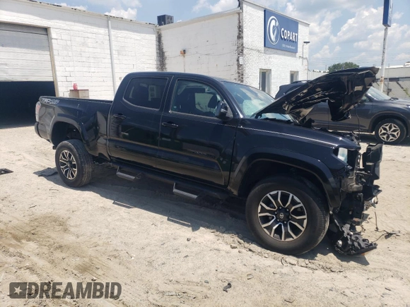 2020 Toyota Tacoma SR5 with VIN 3TMDZ5BN8LM090576, listed as a Copart auction lot 62217495 with 29,996 mi miles and Salvage title. Bid and sale history available at DreamBid. Image 4.