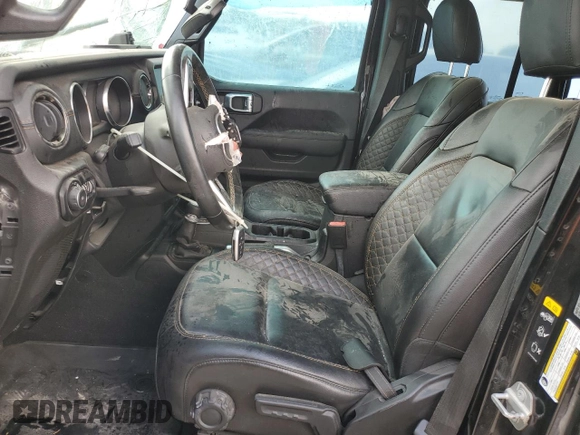 2021 Jeep Wrangler Unlimited Sahara High Altitude with VIN 1C4HJXEM0MW669053, listed as a Copart auction lot 77032134 with 41,133 mi miles and Salvage title. Bid and sale history available at DreamBid. Image 7.
