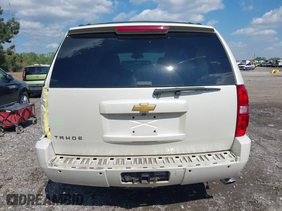 2013 Chevrolet Tahoe LTZ with VIN 1GNSKCE07DR326996, listed as a IAAI auction lot 42203073 with 147,067 mi miles and . Bid and sale history available at DreamBid. Image 16.