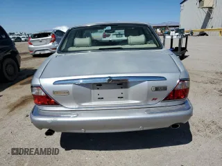 2003 Jaguar XJ 8 z VIN SAJDA14C23LF59484, wystawiony jako Copart lot #50304475 z przebiegiem Nie podano mil oraz Czysty tytuł • Clean title. Historia ofert i sprzedaży dostępna na DreamBid. Obrazek 6.