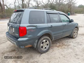 2005 Honda Pilot EX-L with VIN 5FNYF18535B011199, listed as a IAAI auction lot 41802730 with 298,903 mi miles. Bid and sale history available at carsss.com. Image 4.