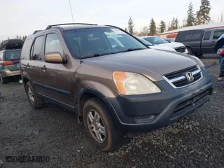 2003 Honda CR-V EX with VIN JHLRD788X3C004304, listed as a IAAI auction lot 41385254 with 143,940 mi miles. Bid and sale history available at carsss.com. Image 1.