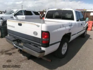 1996 Dodge Ram 1500 with VIN 1B7HC13Z4TJ151867, listed as a IAAI auction lot 42054168 with 293,637 mi miles. Bid and sale history available at carsss.com. Image 4.
