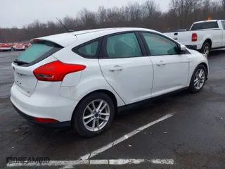 2016 Ford Focus SE with VIN 1FADP3K25GL298329, listed as a IAAI auction lot 41777453 with 100,678 mi miles. Bid and sale history available at carsss.com. Image 4.