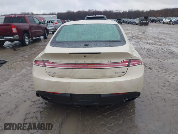 2015 Lincoln MKZ z VIN 3LN6L2J96FR618325, wystawiony jako IAAI lot #41046851 z przebiegiem Nie podano mil oraz . Historia ofert i sprzedaży dostępna na DreamBid. Obrazek 16.