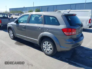 2013 Dodge Journey SE with VIN 3C4PDCAB7DT730744, listed as a IAAI auction lot 41900114 with 186,086 mi miles and . Bid and sale history available at DreamBid. Image 3.