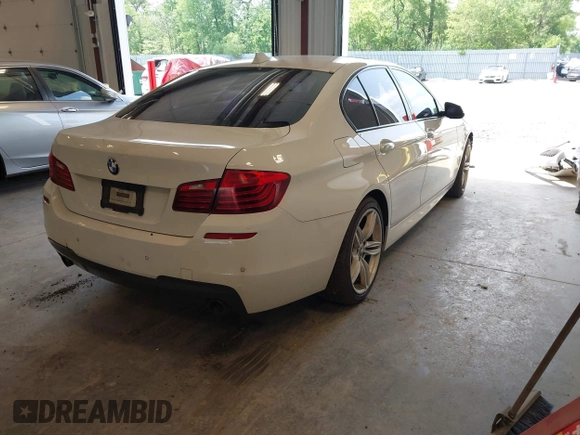 2014 BMW 5 Series 535i xDrive with VIN WBA5B3C58ED530822, listed as a IAAI auction lot 42561366 with 137,880 mi miles and . Bid and sale history available at DreamBid. Image 4.