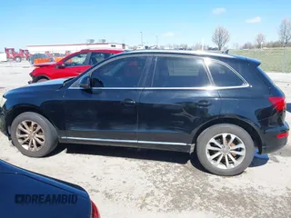 2013 Audi Q5 Premium with VIN WA1CFAFP0DA007630, listed as a IAAI auction lot 41824831 with 149,558 mi miles and . Bid and sale history available at DreamBid. Image 14.