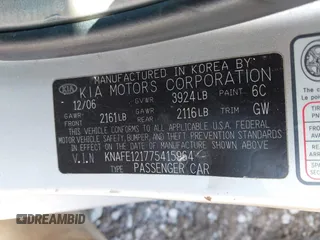 2007 Kia Spectra EX with VIN KNAFE121775415964, listed as a IAAI auction lot 41951831 with 176,903 mi miles. Bid and sale history available at carsss.com. Image 9.