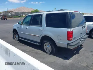 1999 Ford Expedition XLT z VIN 1FMPU18L8XLA69627, wystawiony jako IAAI lot #42847569 z przebiegiem Nie podano mil oraz . Historia ofert i sprzedaży dostępna na DreamBid. Obrazek 3.