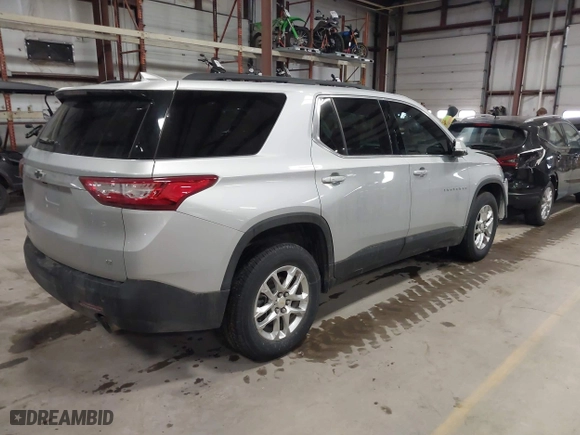 2020 Chevrolet Traverse LT Cloth with VIN 1GNEVGKWXLJ251423, listed as a IAAI auction lot 41650180 with 28,815 mi miles. Bid and sale history available at carsss.com. Image 4.