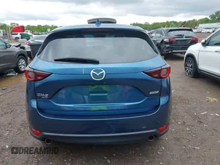 2017 Mazda CX-5 Touring z VIN JM3KFBCL9H0224962, wystawiony jako IAAI lot #42312104 z przebiegiem Nie podano mil oraz . Historia ofert i sprzedaży dostępna na DreamBid. Obrazek 17.