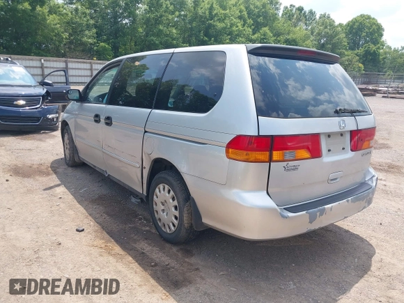 2004 Honda Odyssey LX with VIN 5FNRL18504B129349, listed as a IAAI auction lot 42393492 with 243,232 mi miles and . Bid and sale history available at DreamBid. Image 3.
