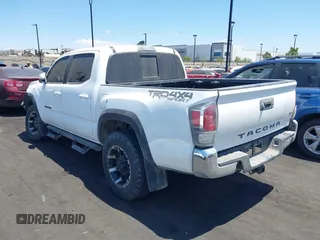 2023 Toyota Tacoma SR with VIN 3TMCZ5AN4PM558760, listed as a IAAI auction lot 42626514 with 39,335 mi miles and . Bid and sale history available at DreamBid. Image 3.