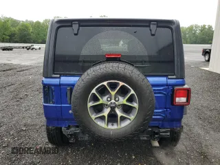 2018 Jeep Wrangler Unlimited Sport with VIN 1C4HJXDG3JW292810, listed as a Copart auction lot 57672705 with 106,378 mi miles and Salvage title. Bid and sale history available at DreamBid. Image 6.